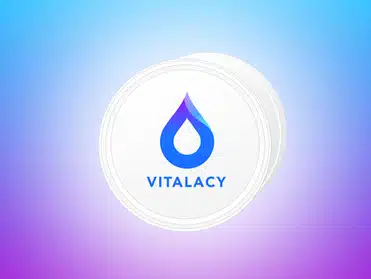 Dispenser Sensor with Vitalacy logo with a blue droplet icon on a gradient blue and purple background.