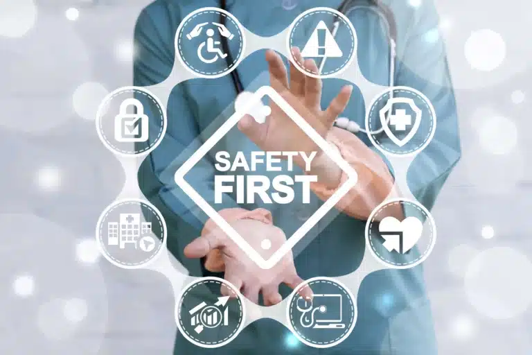 Care Provider with 'Safety First' Sign